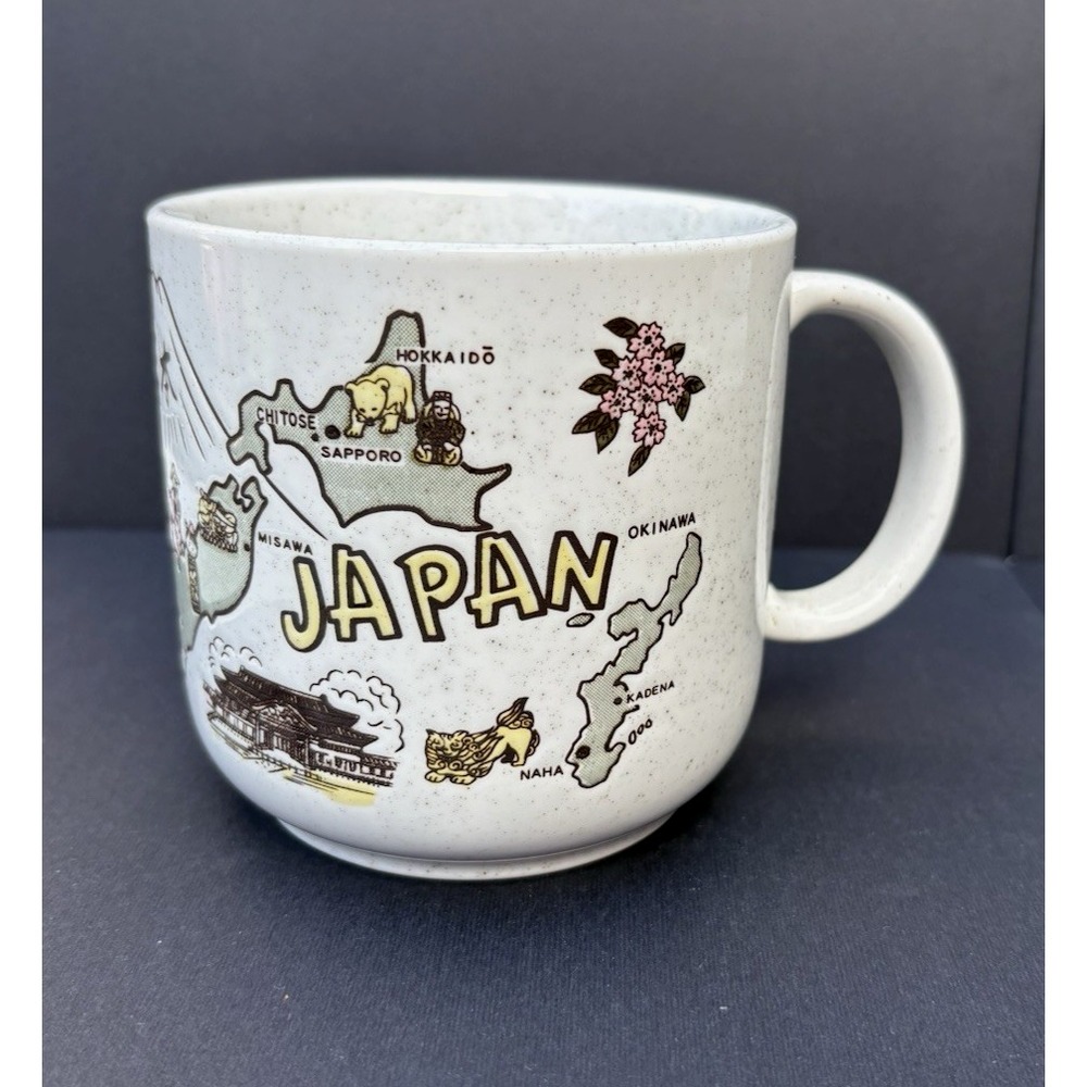 Vintage souvenir mug Japan speckled etched design country outline + landmarks